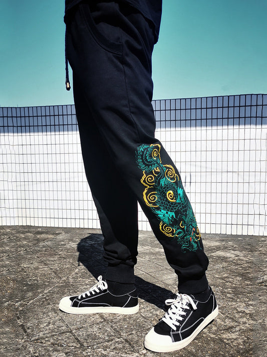 Embroidered dragon-patterned sweatpants